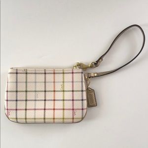 Coach change purse. Cream with gold trim.